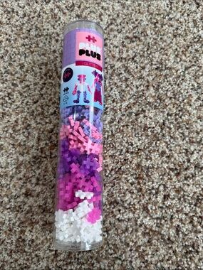 Plus Plus Glitter Build Tube with Pink, Purple, White blocks